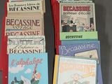 plusieurs livres pour enfants sont empilés sur une table