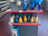 a display of gardening tools on the shelves in the store