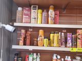 many different types of hair products displayed on the shelves