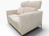 an image of a white couch with two pillows on top of it