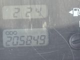 a picture of a car that has a sign on the windshield