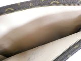the inside of a louis vuitton handbag with a zipper