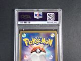a close up of a pokemon trading card on a table