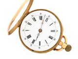 a gold pocket watch with roman numerals on it
