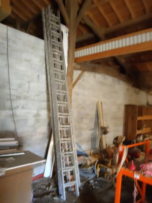 a ladder leaning up against a wall in a room