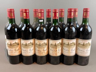 six bottles of wine are lined up in a row on a table