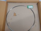 a cardboard box with a round object inside of it