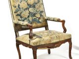 pair of early 20th century carved walnut armchairs with floral upholstered upholstered back