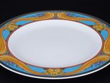 a plate with a blue and orange design on it