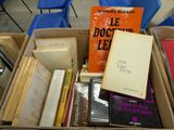 a box full of books sitting on a table
