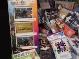 a box full of games and cards on a table