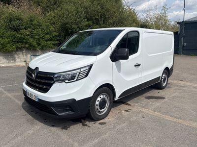 a picture of a white van parked in a parking lot