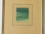 an image of a framed picture of a green ocean scene
