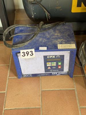 a picture of a machine that is sitting on a tile floor