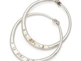 two silver bang bracelets with the word ' love ' engraved on them