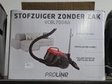 a box with a vacuum on top of a shelf