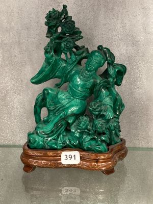 Figurine chinoise en jade sculpté représentant un homme et une femme à cheval