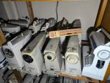 a lot of appliances that are sitting on a shelf