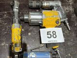 a lot of tools that are laying out on the floor