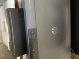 a dell computer sitting on top of a desk