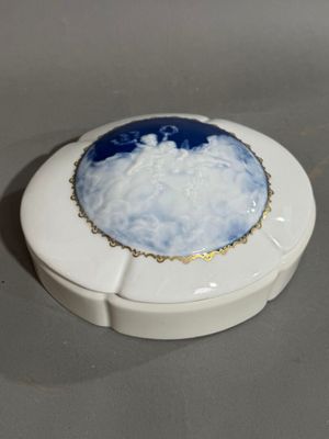 a white box with a blue and white design on it