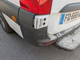a white van parked on the side of the road