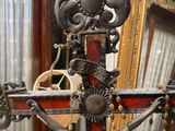 a statue of jesus on a cross on a table