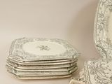 a stack of plates sitting on top of each other on a table