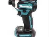a close up of a cordless drill on a white background