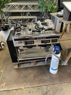 a stove that has a lot of tools on top of it