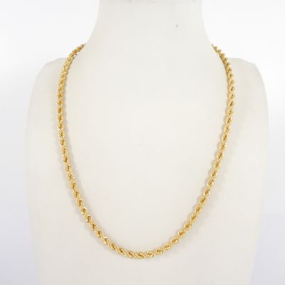 a gold necklace with a twisted rope design on a mannequin neck