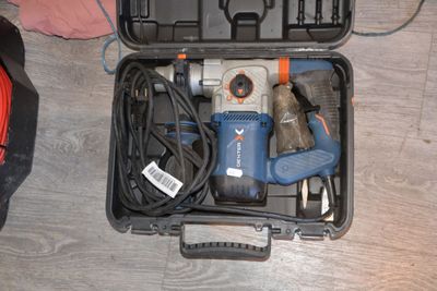 a tool kit in a case on the floor