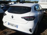 a white car that is parked in a lot