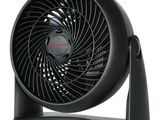 un ventilateur noir posé sur un pied