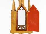 a small mirror that is on top of a stand