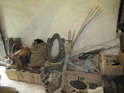 a pile of junk sitting on the floor in a room