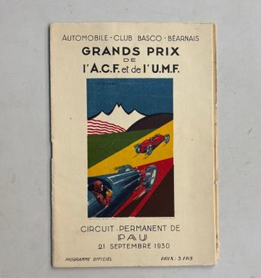 un vieux livre sur lequel figure l'image d'une voiture de course
