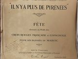 an old book with french writing on it sitting on top of a table