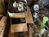 a box full of old items sitting on the floor
