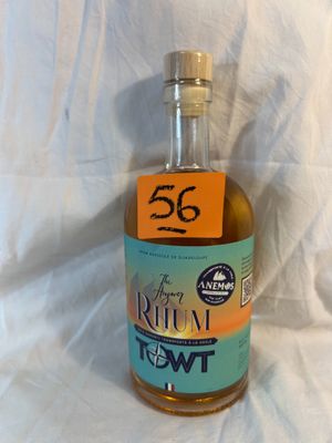 a bottle of liquor with a price tag on it