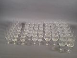 a lot of empty wine glasses sitting on a table