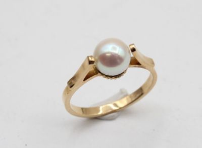 Bague en or rose 18K ornée d'une perle poids brut: 2.