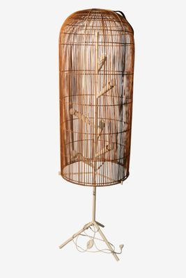 an image of a bird cage on a stand on a white background