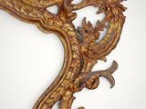 a mirror that has a dragon on it