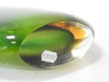 a close up of a glass object with a label on it