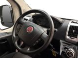 a steering wheel and dashboard of a small car