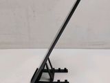 a tablet that is sitting on a stand on a table
