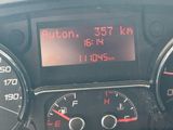 a close up of a car dashboard with a speedometer