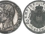 une vieille pièce d'argent sur laquelle figurent le visage d'une femme et une couronne