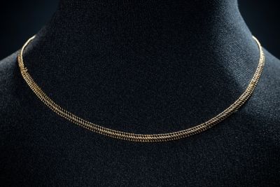 a gold chain necklace on a mannequin mannequin mannequin mannequin mannequin mannequin mannequin mannequin manne